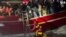 Police Enter Water to Rescue Migrants as Ship Runs Aground in Italy