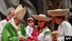 Le pape François lors de la messe pour la Journée des migrants et des réfugiés, le 14 janvier 2018, à la basilique Saint-Pierre.