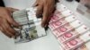 Premier: China Won't Devalue Yuan to Boost Exports