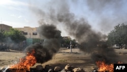 Sudanese protesters respond in Khartoum to the deaths of five student in Al-Obeida, July 29, 2019.