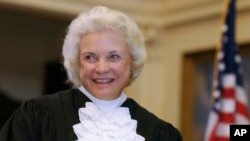 FILE - U.S. Supreme Court Justice Sandra Day O'Connor is shown before administering the oath of office to members of the Texas Supreme Court, Jan. 6, 2003, in Austin, Texas. 