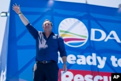 FILE - Opposition Democratic Alliance party leader john Steenhuisen waves at supporters in Pretoria, South Africa, February 17, 2024, for their national manifesto launch in anticipation of the 2024 general elections.