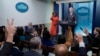 White House press secretary Karine Jean-Pierre calls on a reporter as President Joe Biden makes a surprise appearance to take questions during the daily briefing at the White House in Washington, Oct. 4, 2024.