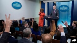 White House press secretary Karine Jean-Pierre calls on a reporter as President Joe Biden makes a surprise appearance to take questions during the daily briefing at the White House in Washington, Oct. 4, 2024.