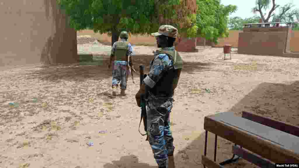 An armed security officer standing at a voting station, in the center town of Youwarou during July 29, 2018 malian presidential election. Photo Voa Bambara Macki Tall.