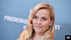 FILE - Reese Witherspoon arrives at the Variety Power of Women luncheon at the Beverly Wilshire hotel.