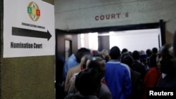 Aspiring members of parliament and councillors register at an election nomination court in Harare, Zimbabwe, June 14, 2018. 