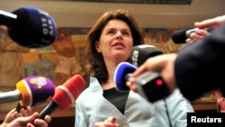 Slovenia's Prime Minister Alenka Bratusek speaks with the media after parliamentary voting session over the budget in Ljubljana, Nov. 15, 2013. 