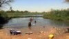 The re-introduction of indigenous prawns into this enclosed area in Lampsar village in northern Senegal is reducing the rate of schistosomiasis infections. (VOA/J. Lazuta)