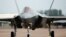 FILE - A Lockheed Martin F-35A fighter taxis along a runway at the Royal International Air Tattoo at Fairford, Britain, July 8, 2016. 