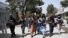 Taliban fighters patrol in the Wazir Akbar Khan neighborhood in the city of Kabul, Afghanistan, Wednesday, Aug. 18, 2021. The Taliban declared an "amnesty" across Afghanistan and urged women to join their government Tuesday, seeking to convince a…