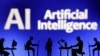 资料照：“人工智能(AI)”字样前方呈现着电脑和智能手机的图像。