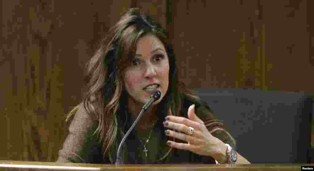 Taya Kyle, wife of slain Navy SEAL Chris Kyle, testifies on the witness stand during the opening day of the capital murder trial of former Marine Eddie Ray Routh at the Erath County Donald R. Jones Justice Center in Stephenville, Texas.