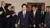 FILE - Taiwanese President Lai Ching-te smiles to the media as he departs for South Pacific at Taoyuan International Airport in Taoyuan, Taiwan, Nov. 30, 2024.