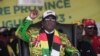 FILE —Zimbabwe's President Emmerson Mnangagwa at a campaign rally in Harare, Aug. 9, 2023. 