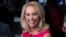 FILE - Former undercover CIA officer Valerie Plame is interviewed on Cheddar, on the floor of the New York Stock Exchange, Oct. 22, 2018.