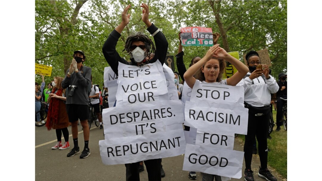 Protesters take part in a demonstration on June 3, 2020, in Hyde Park, London, over the death of George Floyd, a black man who died after being restrained by Minneapolis police officers on May 25.