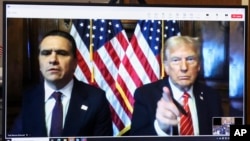 President-elect Donald Trump, right, appears remotely with attorney Todd Blanche for a sentencing hearing in the criminal case in which he was convicted on charges involving hush money, at New York Criminal Court in New York, Jan. 10, 2025. 