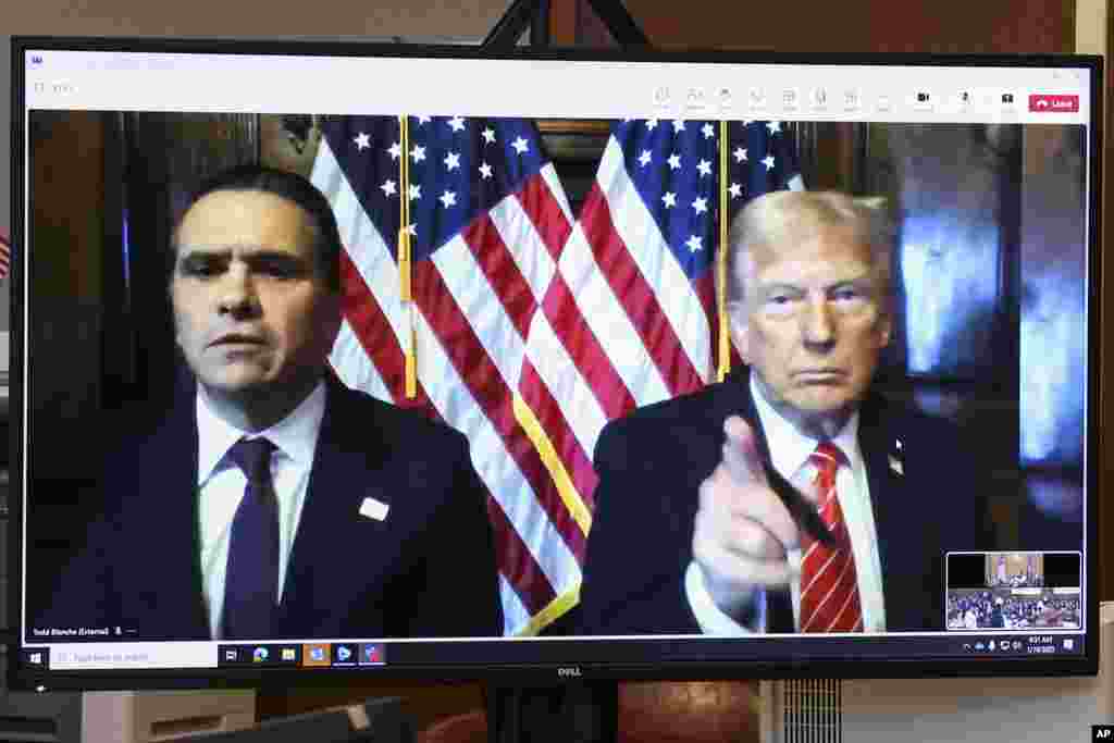 President-elect Donald Trump, right, appears remotely with attorney Todd Blanche for a sentencing hearing in the criminal case in which he was convicted on charges involving hush money, at New York Criminal Court in New York.