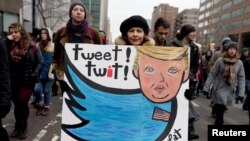 Protesters opposed to President Donald Trump march in Montreal, Canada, Jan. 20, 2017.