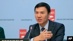 Financial Action Task Force (FATF) president Xiangmin Liu gestures as he speaks during a media conference at the OECD headquarters in Paris, France, Oct. 18, 2019.