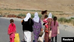 Jin û keçên Êzîdî.