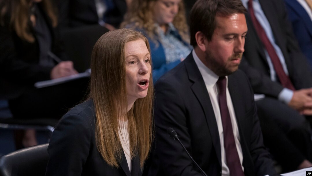 Monika Bickert, head of global policy management at Facebook, joined at right by Nick Pickles, public policy director for Twitter, testifies before the Senate Commerce, Science and Transportation Committee, Sept. 18, 2019.