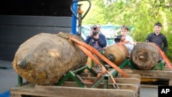 Three defused WWII bombs sit on the bed of a truck in Hannover, northern Germany, May 7, 2017.