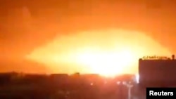 An explosion occurs following an attack, amid the U.S.-led strikes on Houthi targets, in Dhamar, Yemen, in this still image from a video released on Jan. 18, 2024.