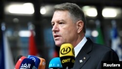 Romanian President Klaus Iohannis arrives at a European Union leaders summit in Brussels, Belgium, Dec. 14, 2018. 
