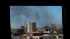 El humo se alza sobre los edificios de la ciudad de Gaza tras los enfrentamientos, el 13 de mayo de 2021.