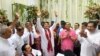 A scion of Sri Lanka’s Rajapaksa family, presidential candidate Namal Rajapaksa, center, gestures as he receives ticket from the Sri Lanka Podujana Peramuna (SLPP) party in Colombo on Aug. 7, 2024.