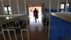 FILE - A patient enters the men's dormitory of the Physical Rehabilitation Reference Centre in Juba, South Sudan, July 7, 2011. 