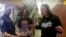 FILE - In this photo from body camera video, two Native American teens Thomas Kanewakeron Gray and Lloyd Skanahwati Gray, are questioned by Colorado State University campus police after they were pulled from a college tour, April 30, 2018, in Colorado. The teen's faces were blurred by the campus police. 