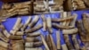 FILE - Seized ivory, transported from Malawi, is displayed during a press conference in Bangkok, Thailand on March 7, 2017. 