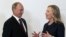 Russian President Vladimir Putin, meets U.S. Secretary of State Hillary Clinton on her arrival at the APEC summit in Vladivostok, Russia, Sept. 8, 2012.