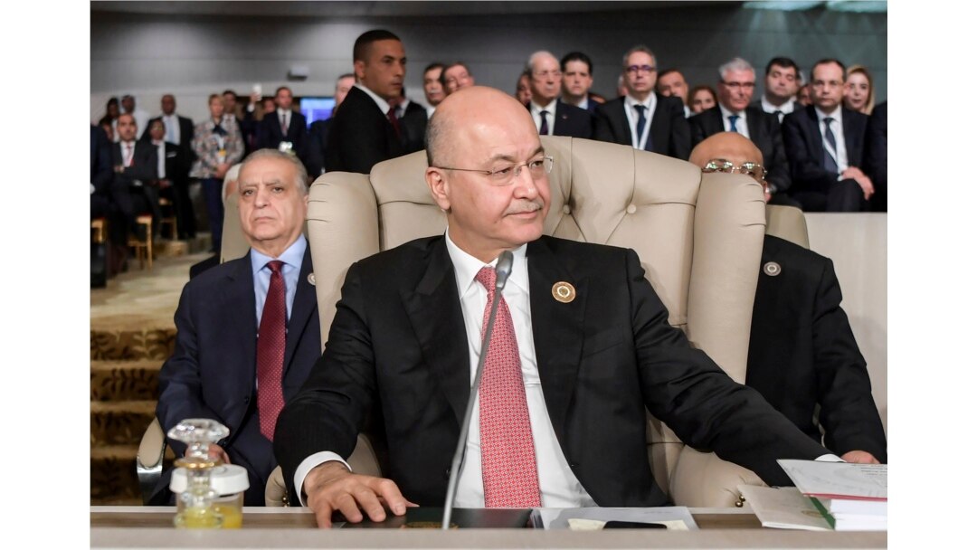 FILE - Iraq's President Barham Saleh attends the opening of the 30th Arab Summit in Tunis, Tunisia, March 31, 2019.