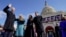 Joe Biden is sworn in as the 46th president of the United States by Chief Justice John Roberts as Jill Biden holds the Bible during the 59th Presidential Inauguration at the U.S. Capitol in Washington, Jan. 20, 2021. 