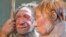 FILE - A March 20, 2009, photo shows reconstructions of a Neanderthal man, left, and woman, at the Neanderthal Museum in Mettmann, Germany.