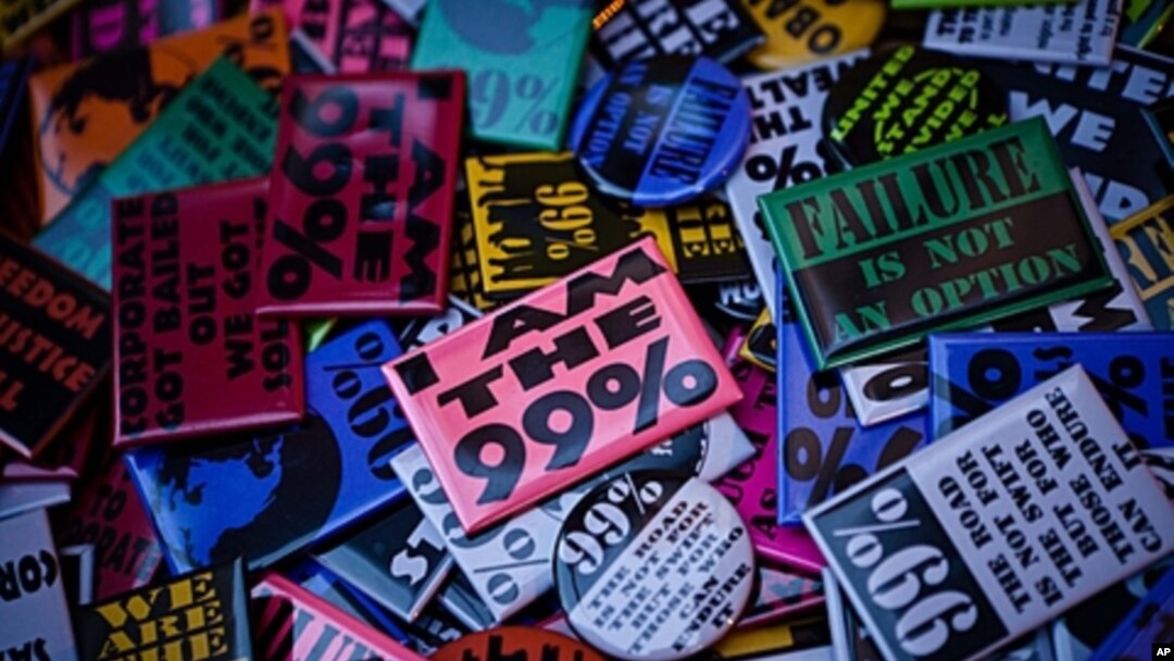 Occupy Wall Street protest buttons are seen in Zuccotti Park, November 11, 2011, in New York.