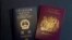 A British National Overseas passports (BNO) and a Hong Kong Special Administrative Region of the People's Republic of China passport are pictured in Hong Kong, Friday, Jan. 29, 2021. 