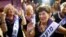Holocaust survivor Carmela Ben Yehuda, 89, dances during the annual Holocaust survivors' beauty pageant in the Israeli city of Haifa, Oct. 30, 2016.