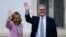 Italian Prime Minister Giorgia Meloni and British Prime Minister Keir Starmer wave as they walk in the garden of Villa Doria Pamphili after their meeting on Sept. 16, 2024 in Rome. 
