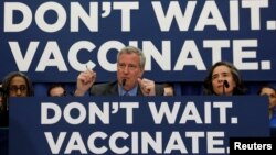 FILE - New York City Mayor Bill de Blasio speaks during a news conference declaring a public health emergency in parts of Brooklyn in response to a measles outbreak, requiring unvaccinated people living in the affected areas to get the vaccine or face fin