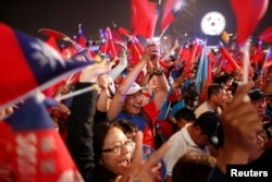 Supporters of Kuomintang party presidential candidate Han Kuo-yu attend his election rally in Kaohsiung, Taiwan, Jan. 10, 2020.
