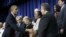 President Barack Obama greets invited guests at the Eisenhower Executive Office Building in Washington, Nov. 28, 2012.