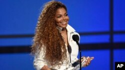 Janet Jackson accepts the ultimate icon: music dance visual award at the BET Awards at the Microsoft Theater on June 28, 2015, in Los Angeles.