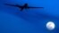 FILE - In this Jan. 31, 2010, photo, an unmanned U.S. Predator drone flies over Kandahar Air Field, southern Afghanistan, on a moonlit night. 
