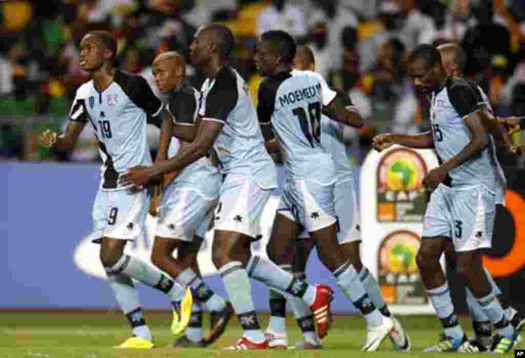 Botswana's Mogakolodi Ngele (L) and his teammates celebrate his goal during their final African Cup of Nations Group D soccer match against Mali at the Stade De L'Amitie Stadium in Libreville February 1, 2012.