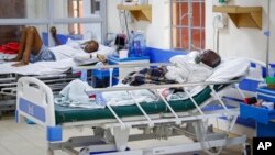 FILE - Coronavirus patients receive oxygen in the intensive care unit of a hospital in Machakos, Kenya, Aug. 20, 2021. 